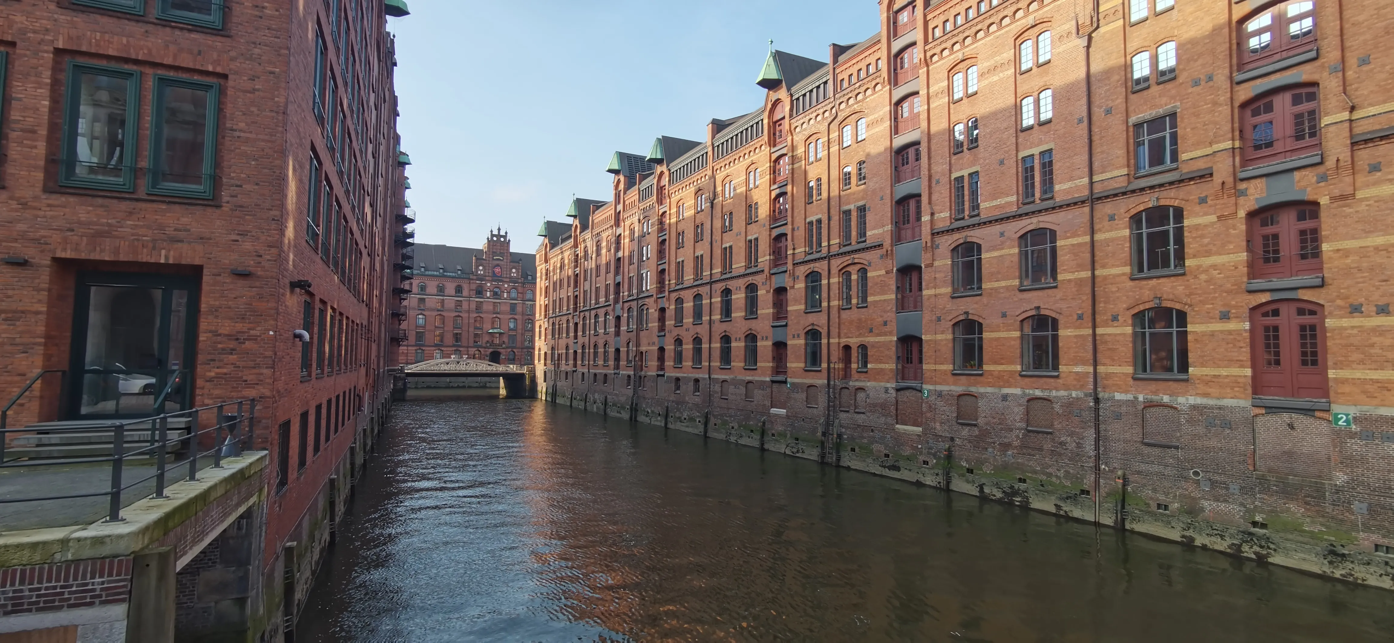 A river canal in the German city of Hamburg, with adjacent houses on both sides